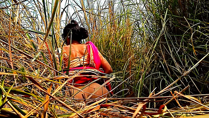 Asian housewife pleasures herself outdoors in the jungle